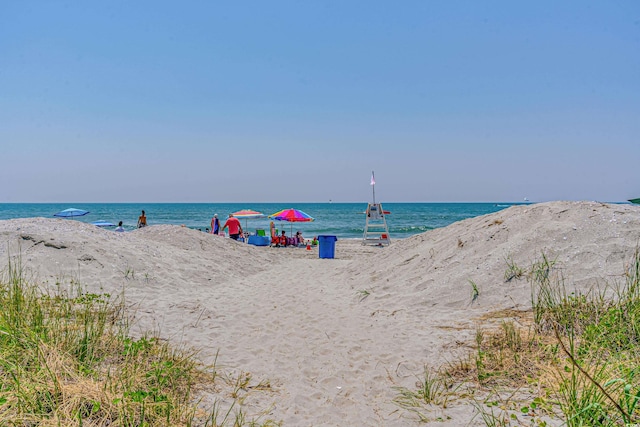 property view of water featuring a view of the beach