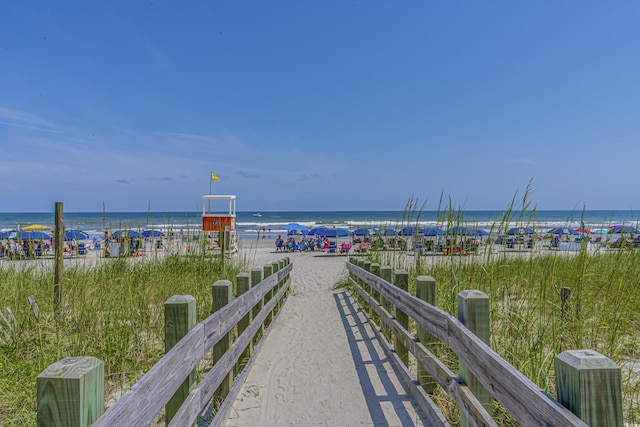 view of water feature with a beach view