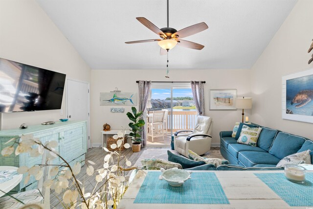 living room with high vaulted ceiling, ceiling fan, and wood-type flooring