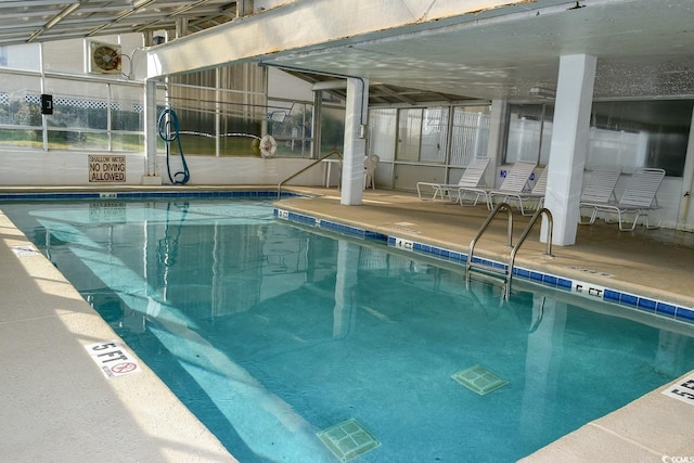 view of pool with a lanai