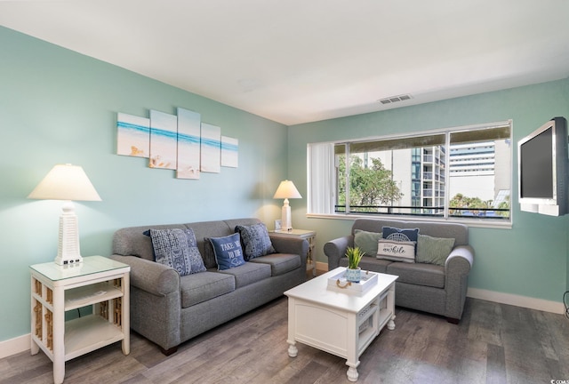 living room with dark wood-type flooring