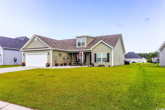 view of front of house with a front yard and a garage