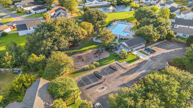 bird's eye view with a water view