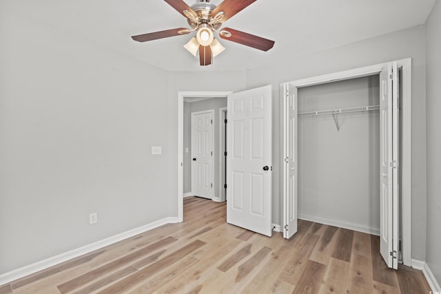 unfurnished bedroom featuring a closet, ceiling fan, and light hardwood / wood-style floors