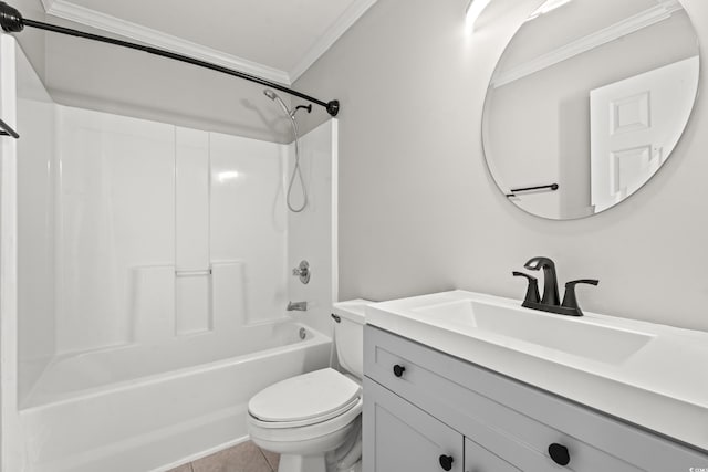 full bathroom featuring toilet, tile patterned flooring, ornamental molding, vanity, and bathing tub / shower combination