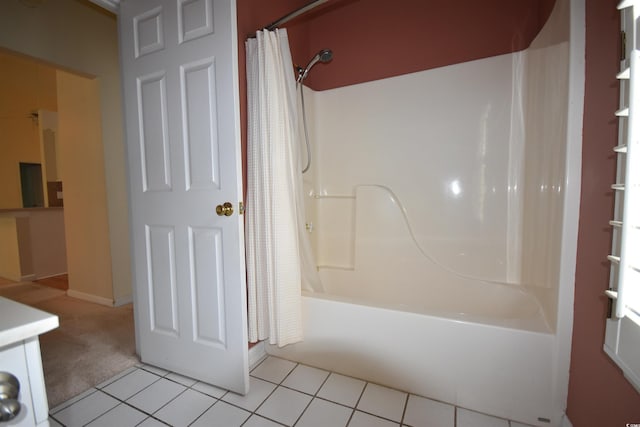 full bathroom featuring tile patterned flooring and shower / bath combo