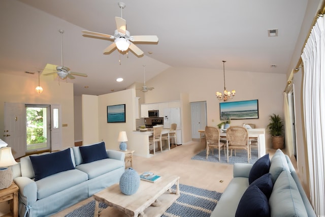 living room with light carpet, high vaulted ceiling, visible vents, and an inviting chandelier