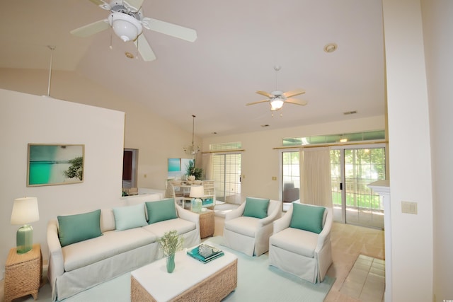 living area featuring vaulted ceiling and a ceiling fan