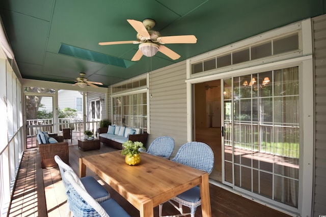 sunroom / solarium with ceiling fan