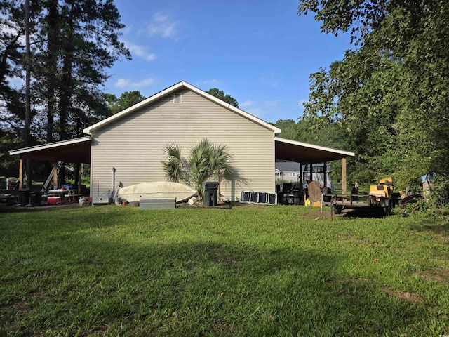 view of property exterior with a lawn