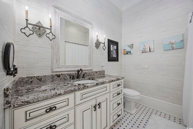 full bath with toilet, curtained shower, vanity, and tile patterned floors