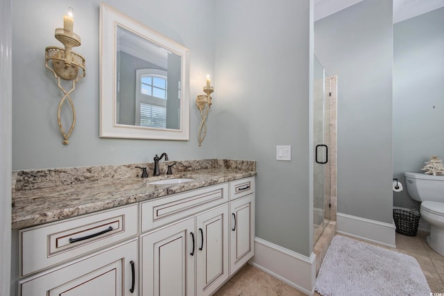 9318 Cove Dr, Myrtle Beach, SC 29572 - full bath with vanity, toilet, tile patterned floors, baseboards, and a shower stall