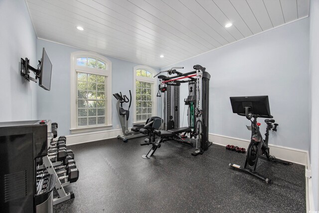 workout room featuring wooden ceiling