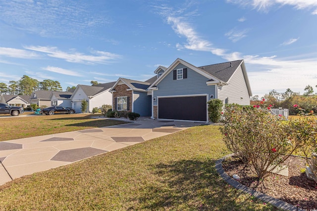 view of front facade with a front yard and a garage