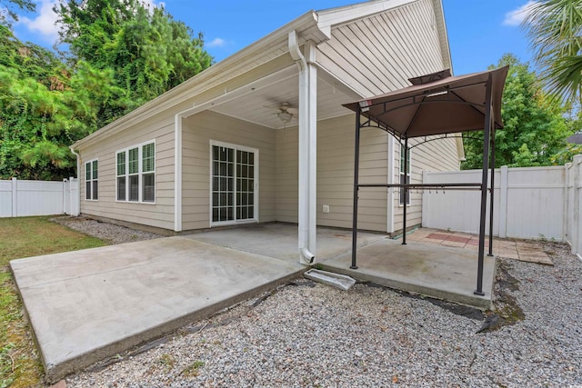 view of patio / terrace featuring a fenced backyard and a ceiling fan