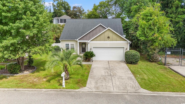 view of front of property with a garage, a shingled roof, concrete driveway, board and batten siding, and a front yard