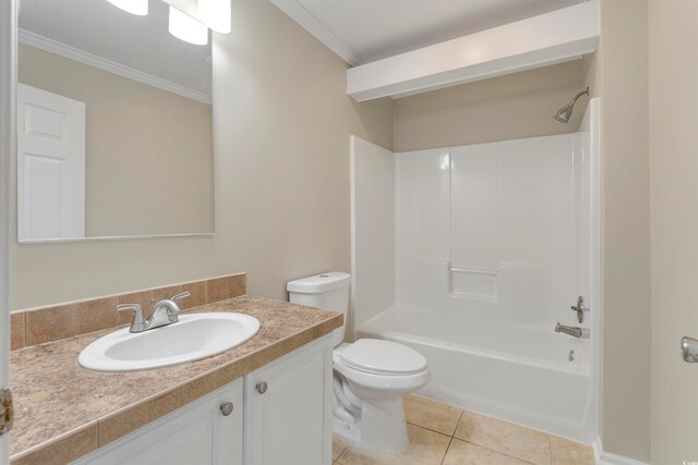 full bathroom featuring tile patterned floors, toilet, bathtub / shower combination, crown molding, and vanity