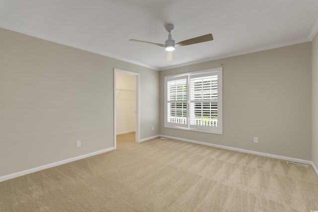 3758 Loblolly Ave, Little River, SC 29566 - carpeted empty room featuring crown molding, ceiling fan, visible vents, and baseboards