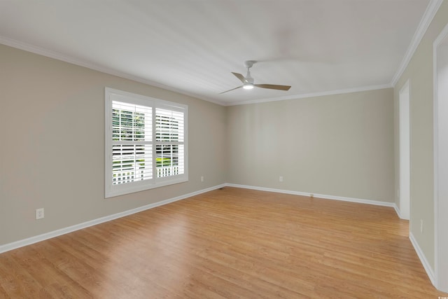 spare room with ceiling fan, ornamental molding, and light hardwood / wood-style flooring