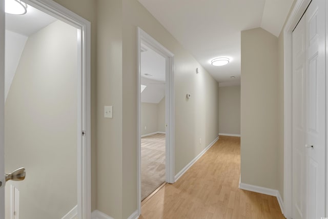3758 Loblolly Ave, Little River, SC 29566 - hall featuring baseboards, vaulted ceiling, and light wood finished floors
