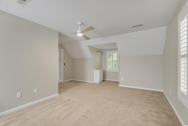 3758 Loblolly Ave, Little River, SC 29566 - additional living space with vaulted ceiling, a ceiling fan, light colored carpet, and visible vents