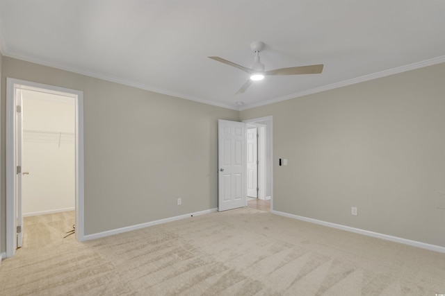 3758 Loblolly Ave, Little River, SC 29566 - unfurnished bedroom with light colored carpet, baseboards, a spacious closet, and ornamental molding