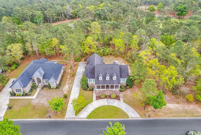 bird's eye view featuring a view of trees