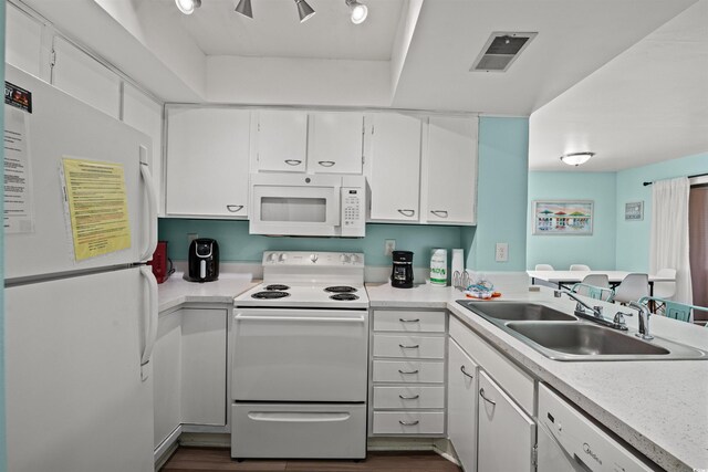 501 Maison Dr Unit B10, Myrtle Beach, SC 29572 - kitchen with white appliances, a sink, white cabinetry, and light countertops