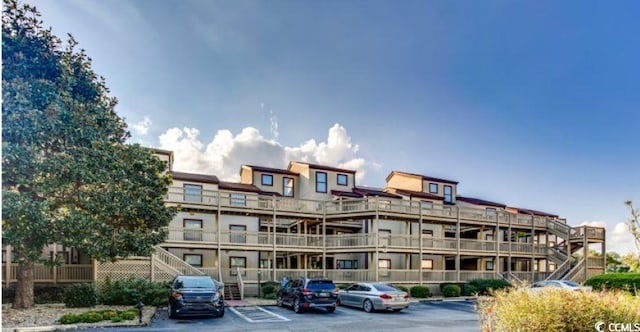 501 Maison Dr Unit B10, Myrtle Beach, SC 29572 - view of property featuring uncovered parking and stairs