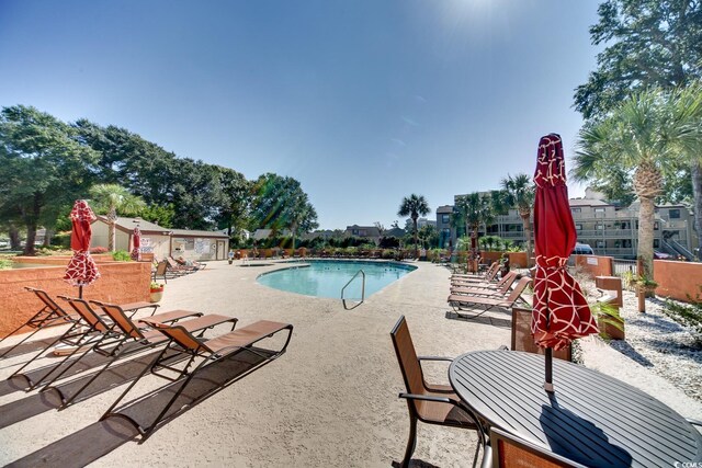 501 Maison Dr Unit B10, Myrtle Beach, SC 29572 - community pool with a patio