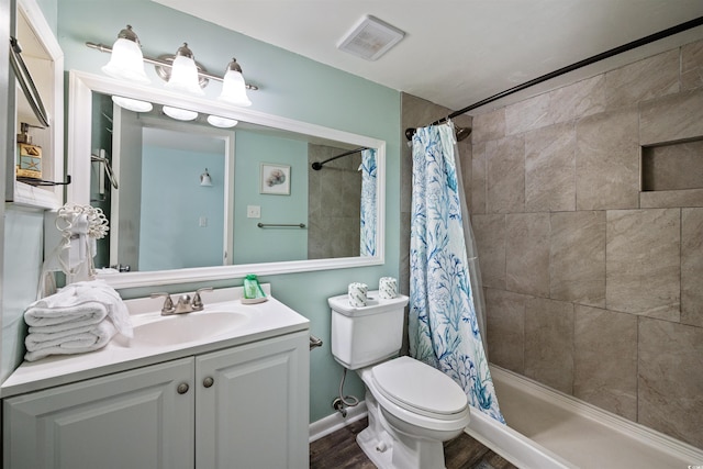 bathroom featuring hardwood / wood-style floors, vanity, toilet, and a shower with shower curtain