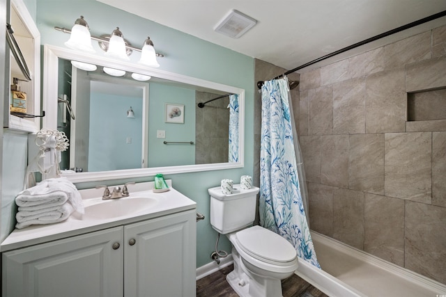 501 Maison Dr Unit B10, Myrtle Beach, SC 29572 - full bathroom featuring a tile shower, toilet, vanity, and wood finished floors