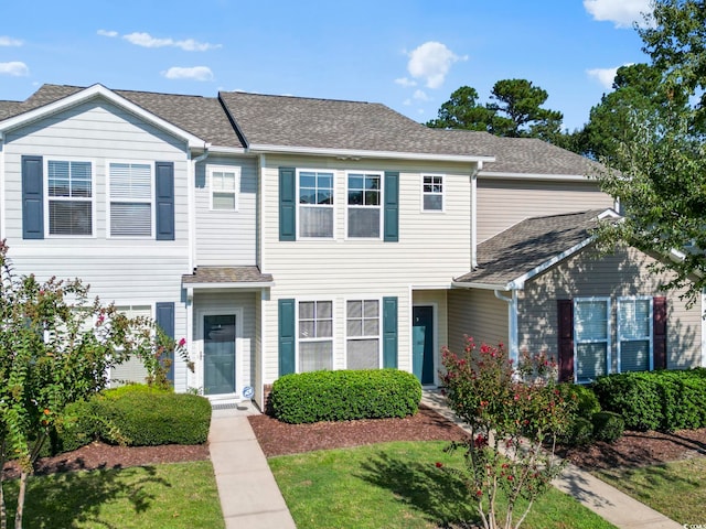 view of front of home with a front yard