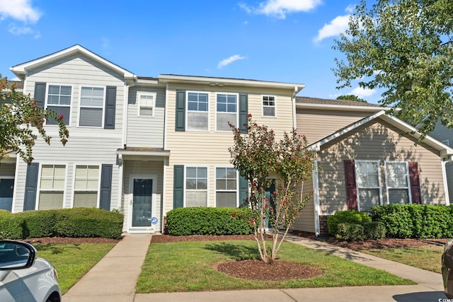 view of front of property with a front lawn