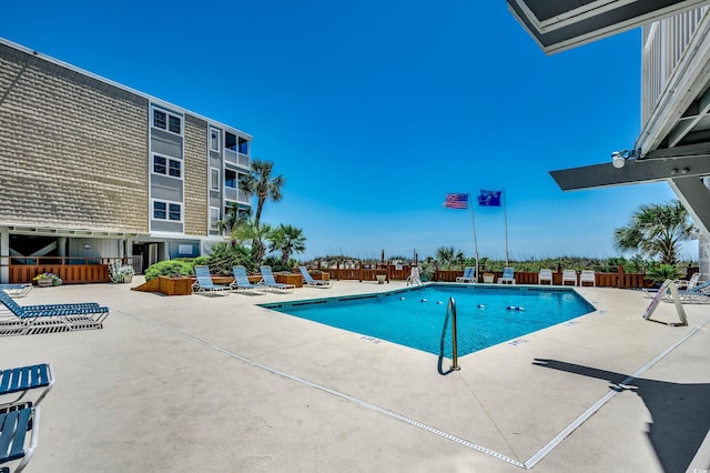 view of pool with a patio area