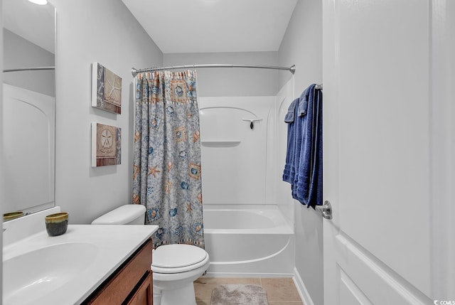 full bathroom featuring vanity, shower / bath combo with shower curtain, toilet, and tile patterned floors