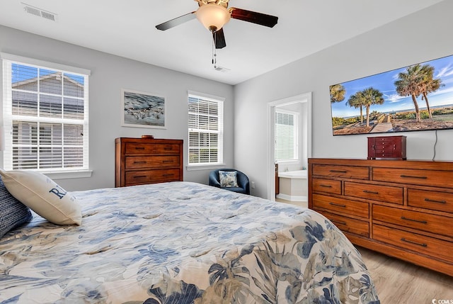 bedroom featuring light hardwood / wood-style flooring and ceiling fan