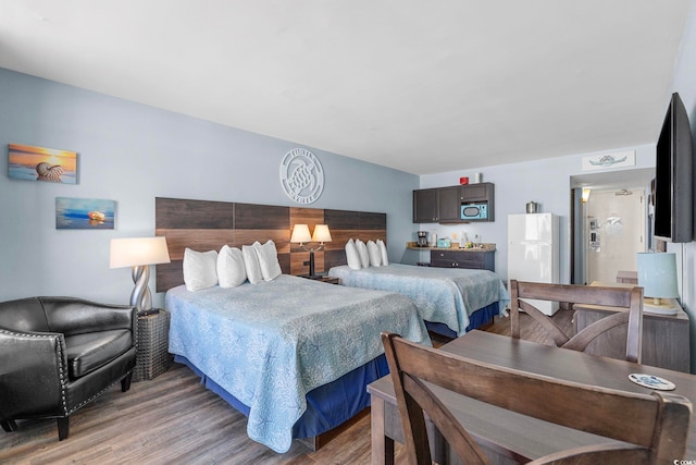 bedroom featuring hardwood / wood-style flooring