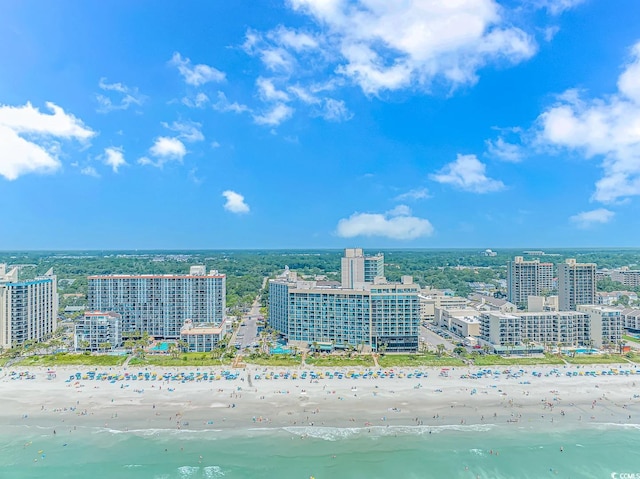 aerial view featuring a view of the beach and a water view