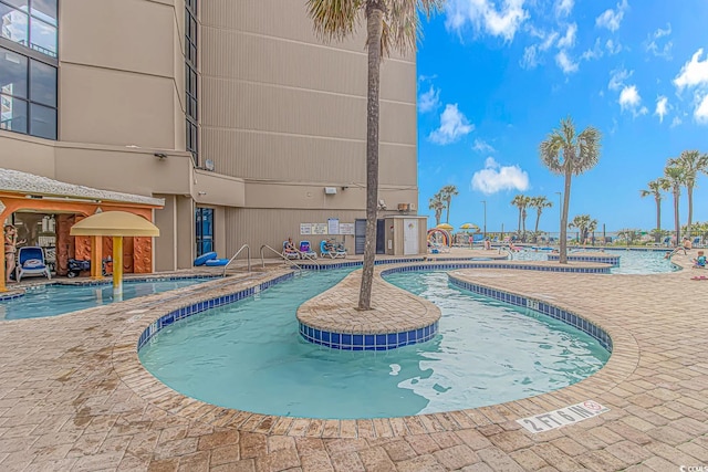 view of pool with a patio area