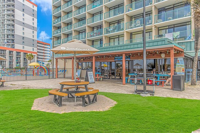 201 74th Ave N Unit 1002, Myrtle Beach, SC 29572 - view of home's community with a yard