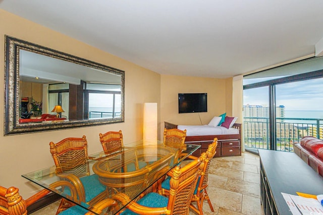 201 74th Ave N Unit 1002, Myrtle Beach, SC 29572 - dining room featuring stone tile floors