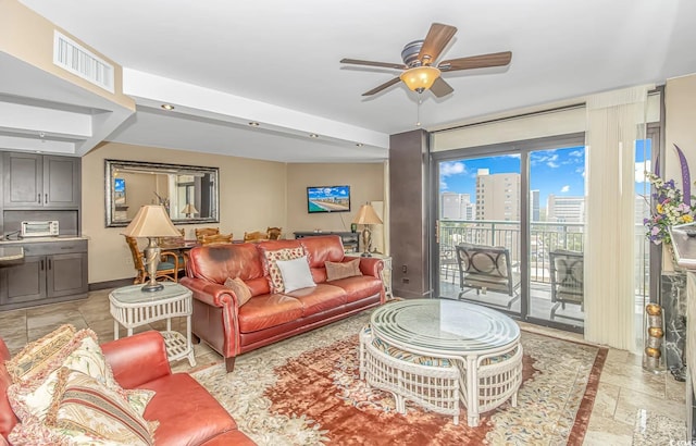 living room with ceiling fan