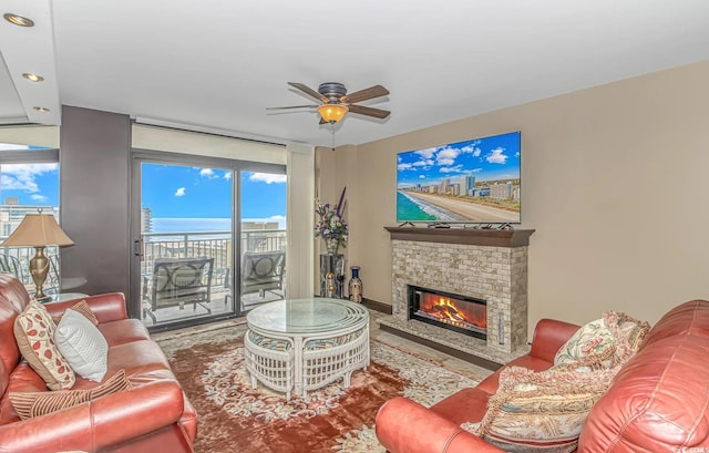 201 74th Ave N Unit 1002, Myrtle Beach, SC 29572 - living area with a brick fireplace, ceiling fan, and recessed lighting