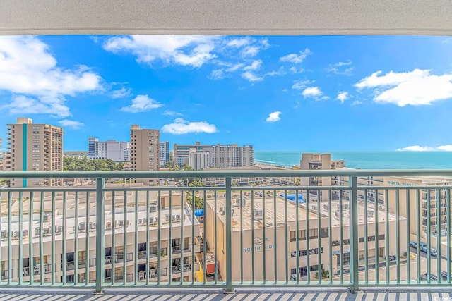 balcony featuring a water view