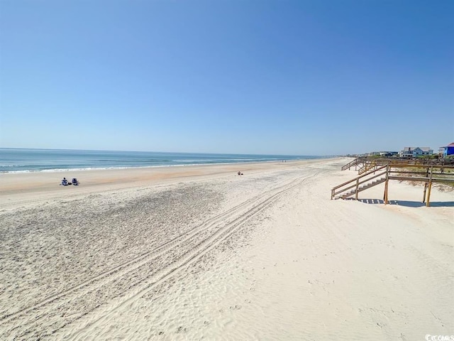 view of water feature with a view of the beach