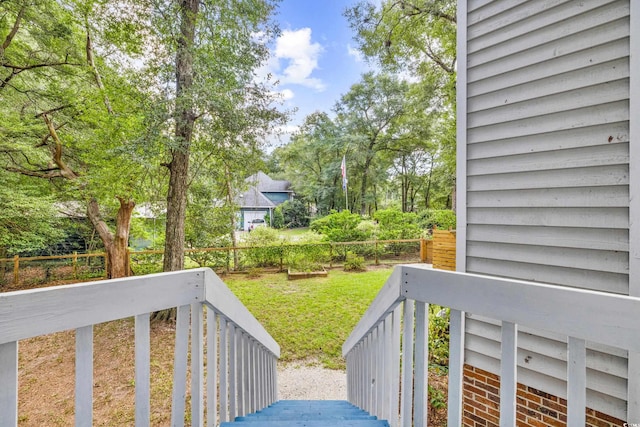 wooden balcony featuring a deck