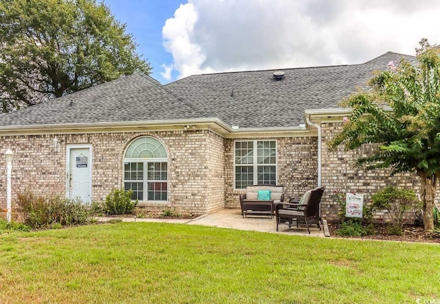 3412 Westminster Dr, Myrtle Beach, SC 29588 - rear view of property with a patio, an outdoor living space, brick siding, a lawn, and a shingled roof