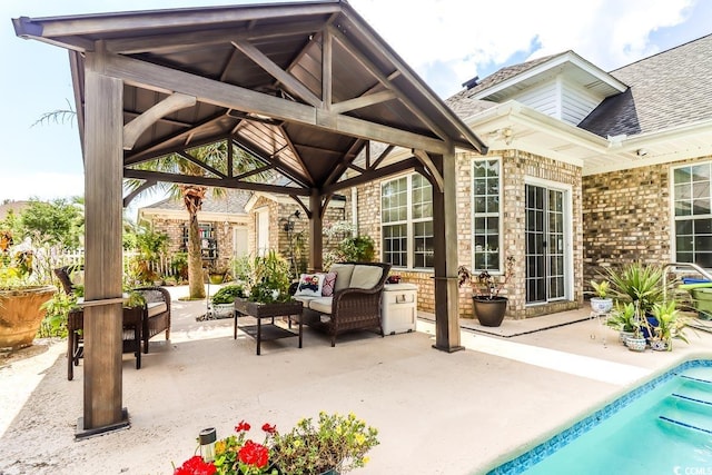 view of patio / terrace featuring outdoor lounge area and a gazebo