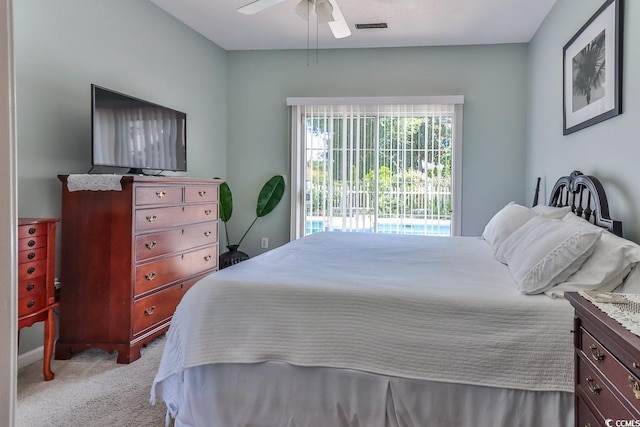 3412 Westminster Dr, Myrtle Beach, SC 29588 - bedroom with access to exterior, visible vents, carpet floors, and a ceiling fan